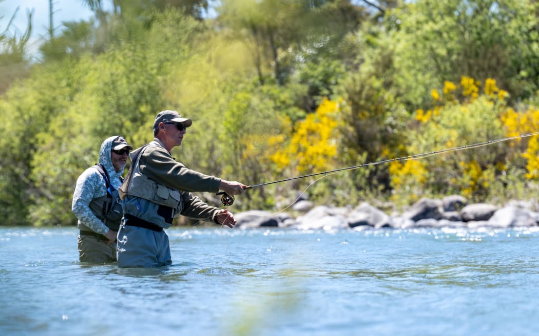 The charity Reel Recovery is using the healing power of fishing to help support men with cancer. A guide and a participant get to work on the Tongariro River near Turangi.