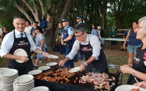 James shaw, Duncan Webb and Eugenie Sage on BBQ duty at Waitangi Day