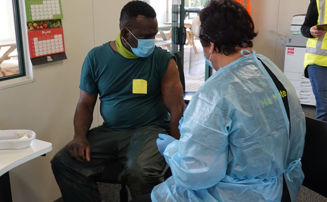 Ni-Vanuatu RSE worker Grabriel Ham being immunised.