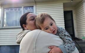 Two-year-old West Auckland toddler Willow is cuddled by her mum, Waimirirangi Rudolph. Willow was reunited with her family on Sunday night after going missing from her home on Zodiac Street in Henderson earlier in the afternoon. She was found by a member of the public wandering on Universal Drive and her disappearance sparked a massive search, involving hundreds of locals.