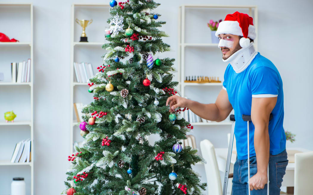 Injured man celebrating christmas at home