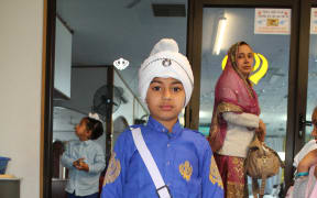 Sikh boy wears the five Ks