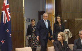 Australian Prime Minister Scott Morrison with New Zealand Prime Minister Jacinda Ardern head into a meeting in July, 2019.
