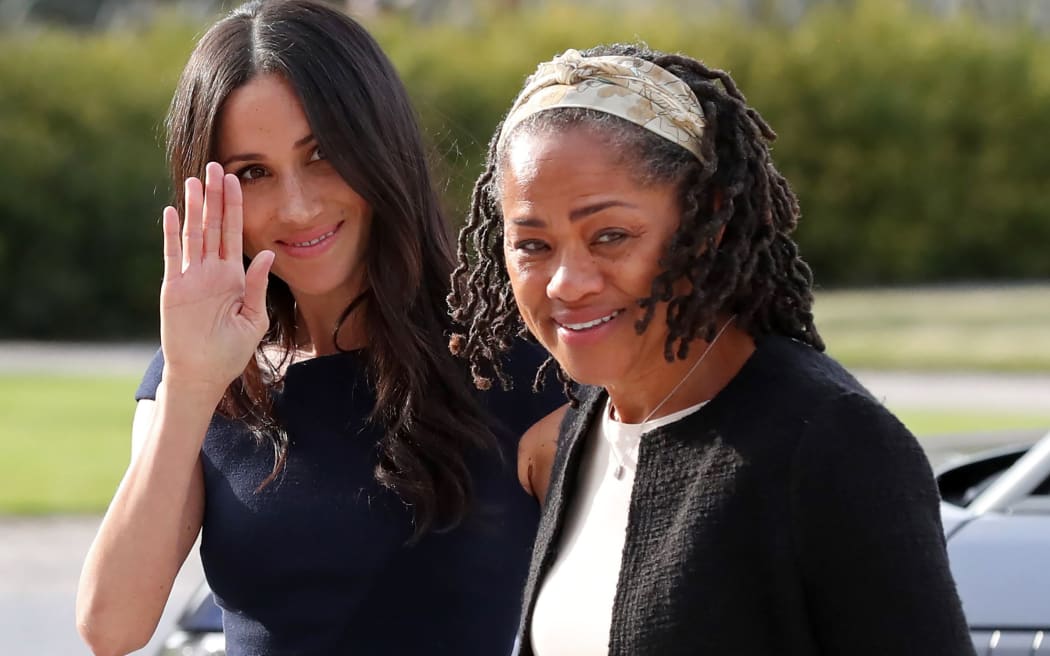 Meghan Markle (L) arrives with her mother Doria Ragland at Cliveden House hotel in the village of Taplow near Windsor on the eve of her wedding to Britain's Prince Harry.