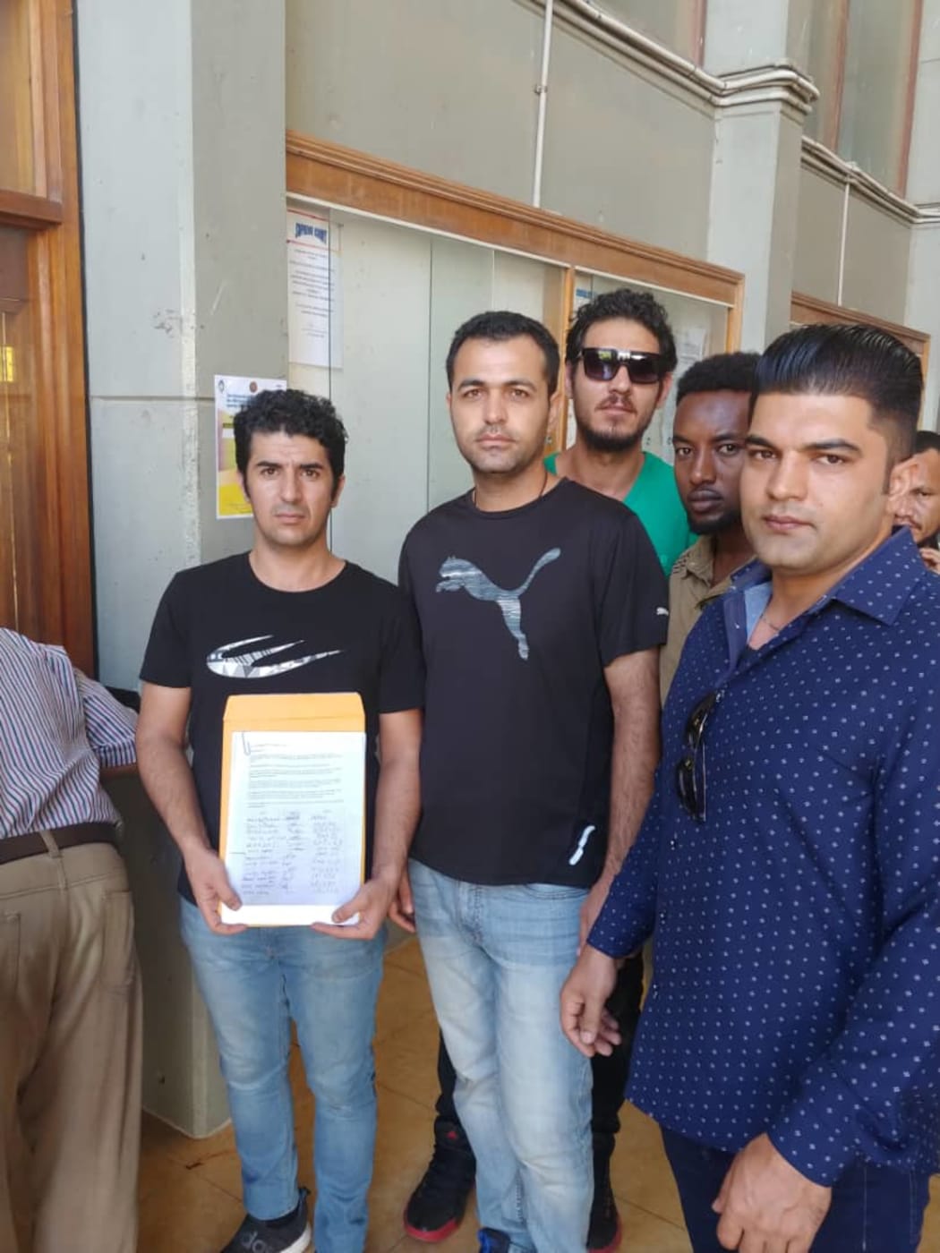 The Manus Island refuges deliver the petition to the PNG Supreme Court.