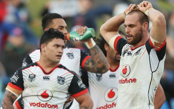 Isaac Luke (left) and Simon Mannering ponder yet another Warriors loss.