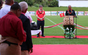 Tonga's prime minister 'Akilisi Pohiva (right) in an All Blacks jersey speaking at the reopening of Teufaiva Stadium in Nuku'alofa as New Zealand prime minister Bill English, in an 'Ikale Tahi jersey looks on. 16 June 2017
