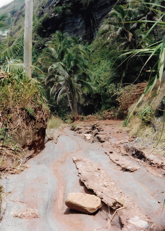 A washed out road after a cyclone, 1992.