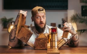 Chris Ramsay poses with an impressive looking puzzle.