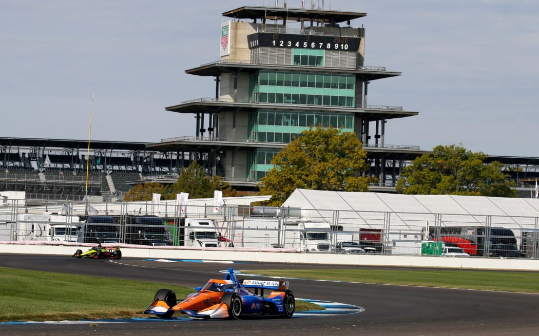 Indy Car driver Scott Dixon (9) drives through turn 8 during qualifying for the IndyCar Harvest GP Race 2 on October 3, 2020, at the Indianapolis Motor Speedway in Indianapolis, Indiana.