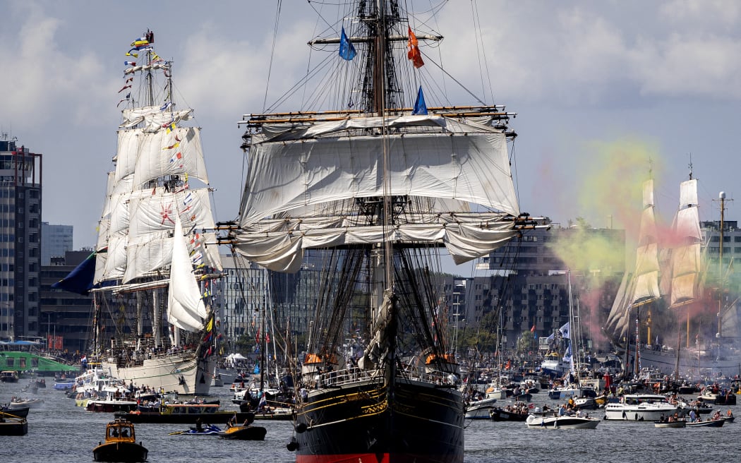 The Clipper Stad Amsterdam ship sails in a Sail-in Parade during the 50th edition of SAIL Amsterdam festival, in Amsterdam on August 20, 2025. (Photo by Ramon van Flymen / ANP / AFP) / Netherlands OUT / NETHERLANDS OUT / NETHERLANDS OUT
