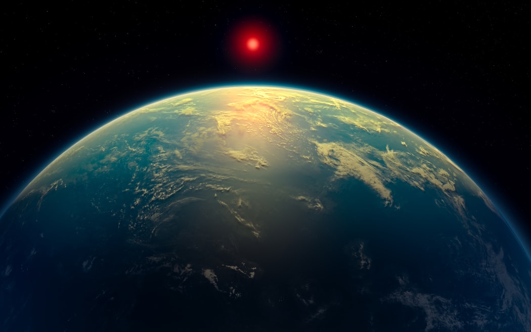 A handout artist's impression released on April 17, 2025 by N. Madhusudhan/University of Cambridge, shows the K2-18b super-Earth, a hycean world, such as exoplanet K2-18b which astronomers say they have found the strongest yet “hints” of the life outside this solar system. Astronomers announced on April 17, 2025 they have detected the most promising "hints" yet of potential life on a planet beyond our solar system, though other scientists expressed scepticism. There has been vigorous debate in scientific circles about whether the planet K2-18b, which is 124 light years away in the Leo constellation, could be an ocean world capable of hosting microbial life. (Photo by Handout / University of Cambridge / AFP) / RESTRICTED TO EDITORIAL USE - MANDATORY CREDIT "AFP PHOTO /  UNIVERSITY OF CAMBRIDGE  / N. MADHUSUDHAN" - HANDOUT - NO MARKETING NO ADVERTISING CAMPAIGNS - DISTRIBUTED AS A SERVICE TO CLIENTS