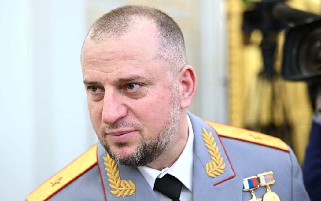In this pool photograph distributed by Russian state owned agency Sputnik, Deputy Chief of the Main Directorate for Military-Political Work of the Russian Defense Ministry, Apti Alaudinov looks on ahead of the inauguration ceremony of Russia's President Vladimir Putin in the Kremlin on May 7, 2024. Chechen commander Apti Alaudinov gives Russians upbeat bulletins on their forces' progress against Ukraine's incursion in the Kursk region. Surprised by the Kursk incursion and unable to expel Ukrainian troops in over three weeks, Russia's top brass rarely speak in public about it. Filling this gap is the 50-year-old Alaudinov, apparently speaking from the combat zone. (Photo by Sergei BOBYLYOV / POOL / AFP) / TO GO WITH AFP STORY BY ANNA MALPAS
 / EDITOR'S NOTE : THIS IMAGE IS DISTRIBUTED BY RUSSIAN STATE OWNED AGENCY SPUTNIK