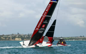 New Zealand's Youth America's Cup AC40 capsizes on the Waitemata Harbour.