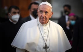 Pope Francis leaves the Syriac Catholic Cathedral of Our Lady of Salvation (Sayidat al-Najat) in Baghdad at the start of the first ever papal visit to Iraq on March 5, 2021.