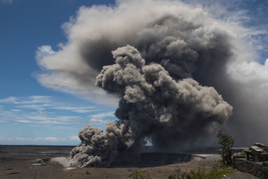 Another dark ash plume rose from the Overlook crater.