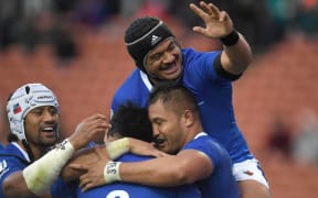 Samoa celebrate a try against Tonga.