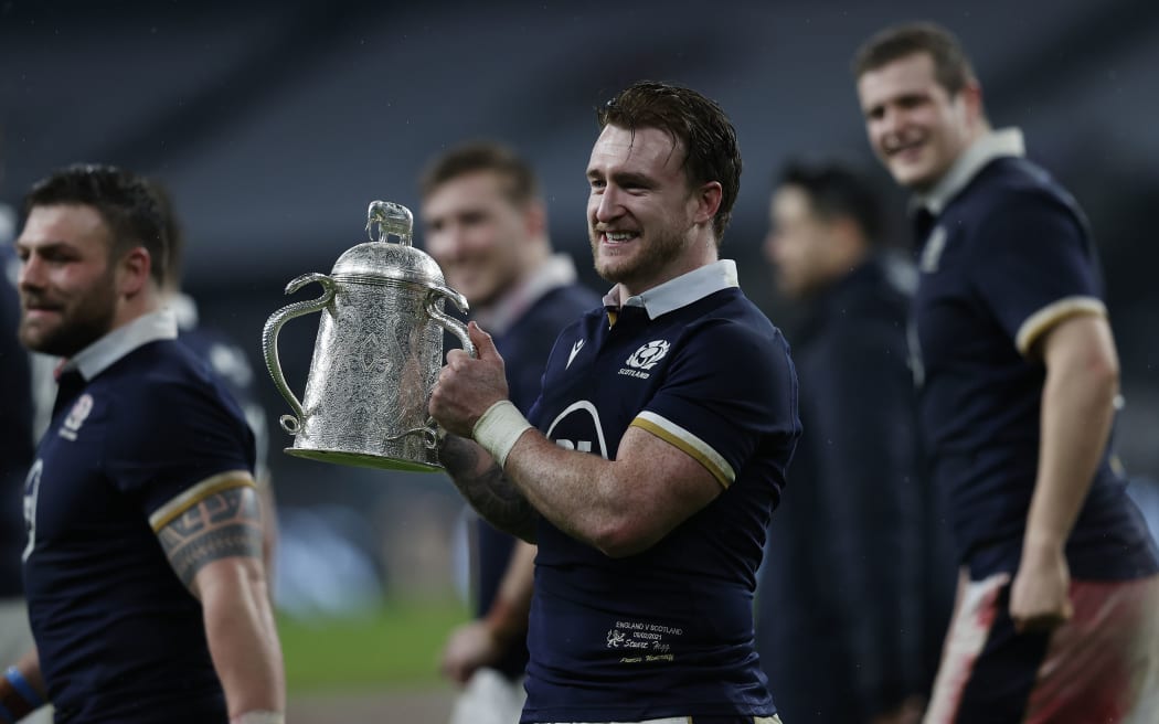 Scotland's full-back Stuart Hogg holds the Calcutta Cup after the Six Nations rugby union match between England and Scotland at Twickenham Stadium in south west London on February 6, 2021. (Photo by Adrian DENNIS / AFP)