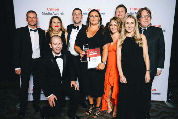 Miriyana Alexander with the newspaper of the year award flanked by other New Zealand Herald journalists at the Canon Media Awards.