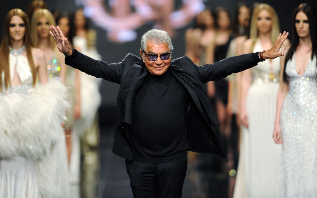 (FILES) Italian fashion designer Roberto Cavalli attends his fashion show on late evening on June 10, 2013, in the Montenegrin coastal town of Budva. Italian fashion designer Roberto Cavalli has died at 83, Italian medias announced on April 12, 2024. (Photo by SAVO PRELEVIC / AFP)