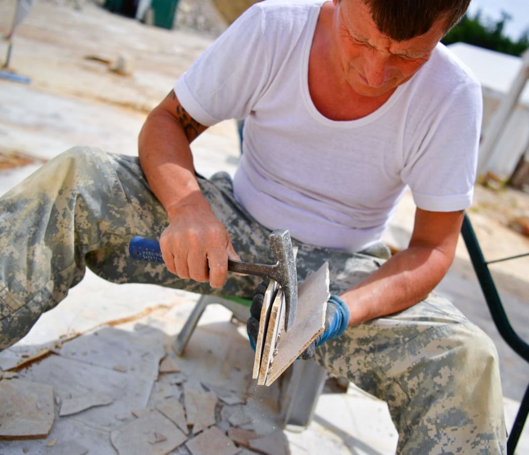 Adi Weller working at the dig in the stone quarry near Wattendorf. The stone quarry near Wattendorf produces daily well preserved fossils, including one of a gyrodus macrophthalmus hexagonus, which will be turned over to the Bamberg Museum of Natural History on 26 June.