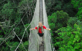Meg Lowman on a canopy walkway in Peru