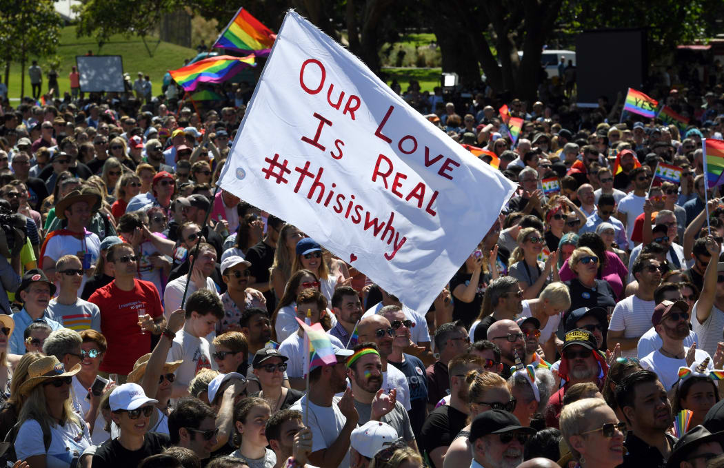People celebrate the result of the same-sex marriage vote in Australia.