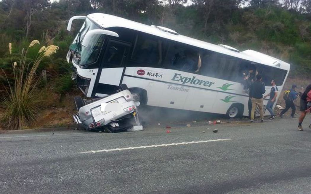 The crashed vehicles, shortly before they caught fire.