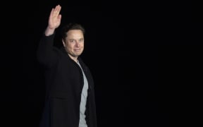 (FILES) In this file photo taken on February 10, 2022 Elon Musk gestures as he speaks during a press conference at SpaceX's Starbase facility near Boca Chica Village in South Texas. - Twitter suspended December 15, 2022, the accounts of more than a half-dozen journalists who had been writing about the company and its new owner Elon Musk. Some of the journalists had been tweeting about Twitter shutting down an @ElonJet account that tracked flights of the billionaire's private jet and about versions of that account hosted at other social networks. (Photo by JIM WATSON / AFP)