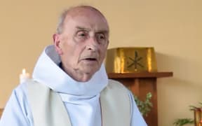 Father Jacques Hamel celebrating a mass in the church of Saint-Etienne-du-Rouvray in June.