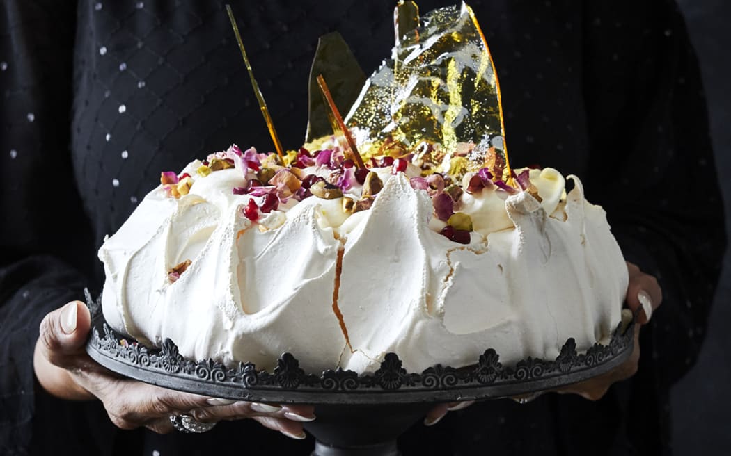 Pavlova with rose cream, cardamom and salted caramel shards