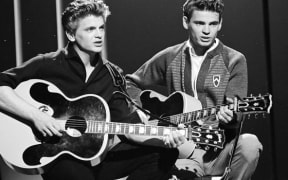 The Everly Brothers (Phil, left, and Don) perform on ABC's "American Bandstand" on July 9, 1960