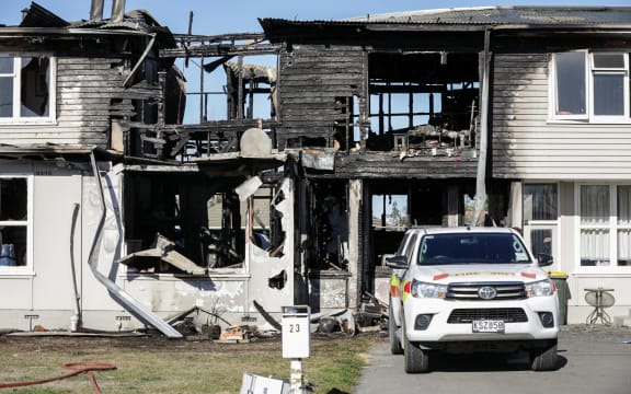 One person has died after a fire at a housing block at Burnham military camp, just outside of Christchurch.