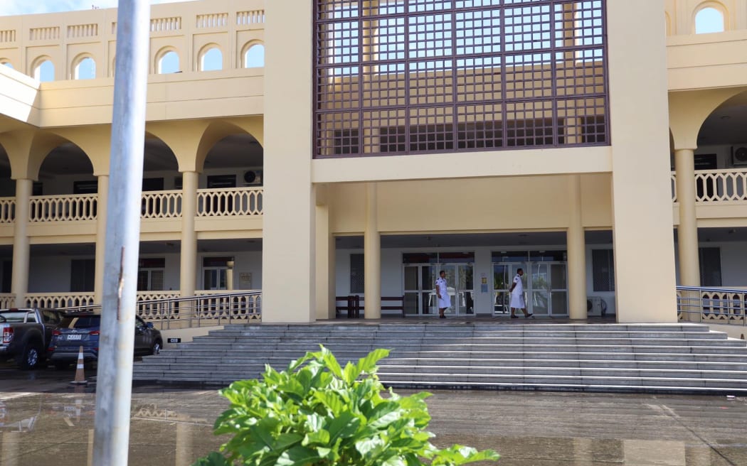 Police guard entrance at the Supreme Court in Samoa.