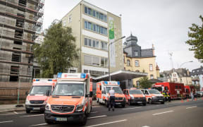 Ambulances outside Buergerhospital, which is to be evacuated due to a bomb disposal in Frankfurt, Germany.
