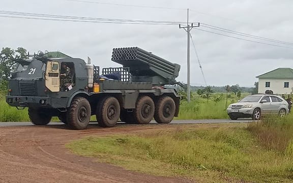 A Cambodian BM-21 multiple rocket launcher returns in Preah Vihear province from the Cambodia-Thai border as troops from both sides clash on 24 July.