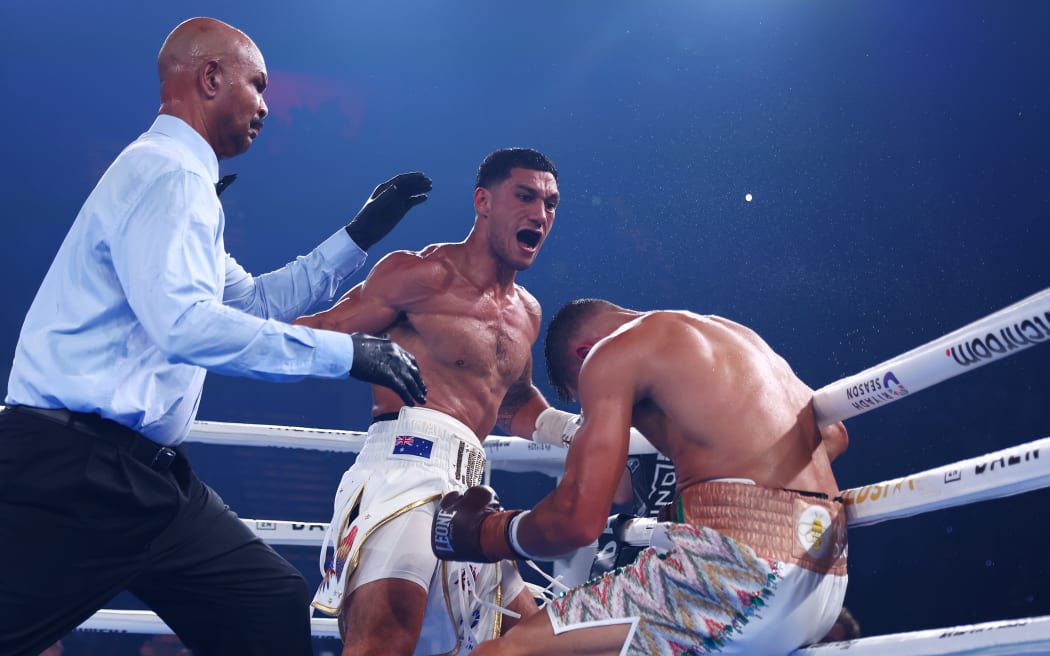 Jai Opetaia knocks down David Nyika during the IBF And Ring Magazine Cruiserweight World Title Fight at the Gold Coast Convention Centre on 8 January 2025.