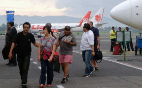 Helen and Michael Chan, the family of Bali Nine Andrew Chan arrive in Yogyakarta, Indonesia.