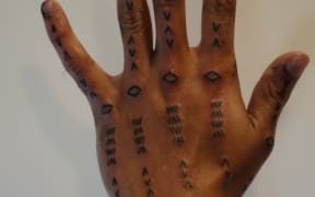 Finished hand tattoo, designed by Vaimaila Urale, tattooed by Chris Amosa.