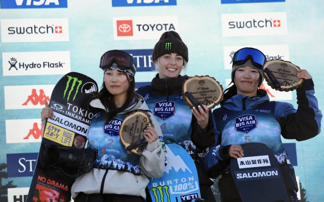 FIS Snowboard Women’s Big Air World Cup podium. Kokomo Murase (JPN) 2nd, Zoi Sadowski-Synnott (NZL) 1st, Momo Suzuki (JPN) 3rd.