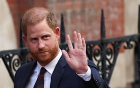 Britain's Prince Harry, Duke of Sussex waves as he departs the the Royal Courts of Justice, Britain's High Court, in central London, on 9 April, 2025 following the second day of his appeal hearing over the downgrading of his personal security during visits in Britain.