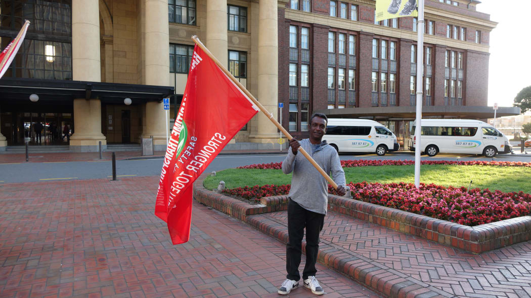 Union member and train driver Roshn Sam outside Wellington railway station.