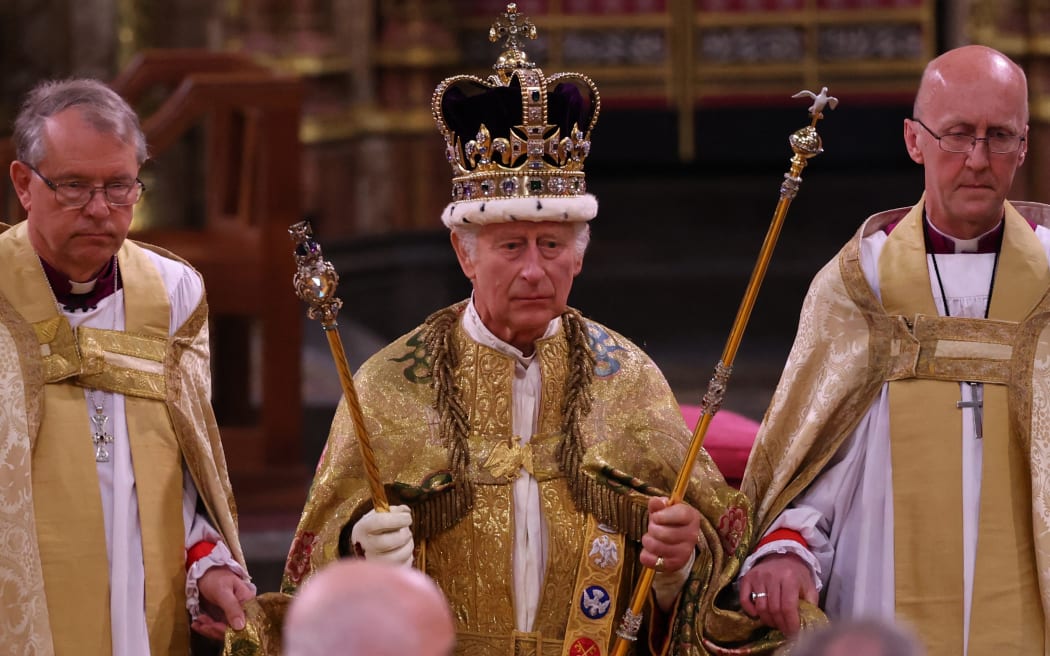 Britain's King Charles III with the St Edward's Crown on his head attends the Coronation Ceremony inside Westminster Abbey in central London on May 6, 2023. - The set-piece coronation is the first in Britain in 70 years, and only the second in history to be televised. Charles will be the 40th reigning monarch to be crowned at the central London church since King William I in 1066. Outside the UK, he is also king of 14 other Commonwealth countries, including Australia, Canada and New Zealand. Camilla, his second wife, will be crowned queen alongside him and be known as Queen Camilla after the ceremony. (Photo by Richard POHLE / POOL / AFP)