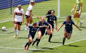 Wellington Phoenix celebrate a goal to Michaela Robertson during the women's A-League 1-1 draw with Western Sydney.
