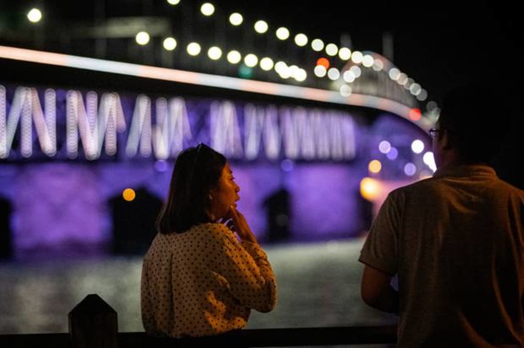 The Auckland Harbour Bridge lit up to celebrate New Year's Eve.