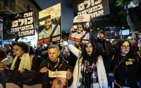 Families of Israelis held hostage in Gaza and supporters protest for the release of hostages held in Gaza outside the home of Minister of Strategic Affairs Ron Dermer in Jerusalem, Israel, on April 13, 2025. (Photo by Saeed Qaq/NurPhoto) (Photo by Saeed Qaq / NurPhoto / NurPhoto via AFP)