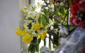 Flowers left at the first Friday prayers after sentencing.