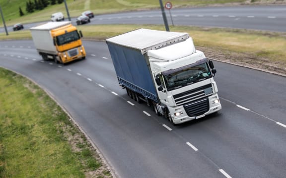 Trucks on highway.