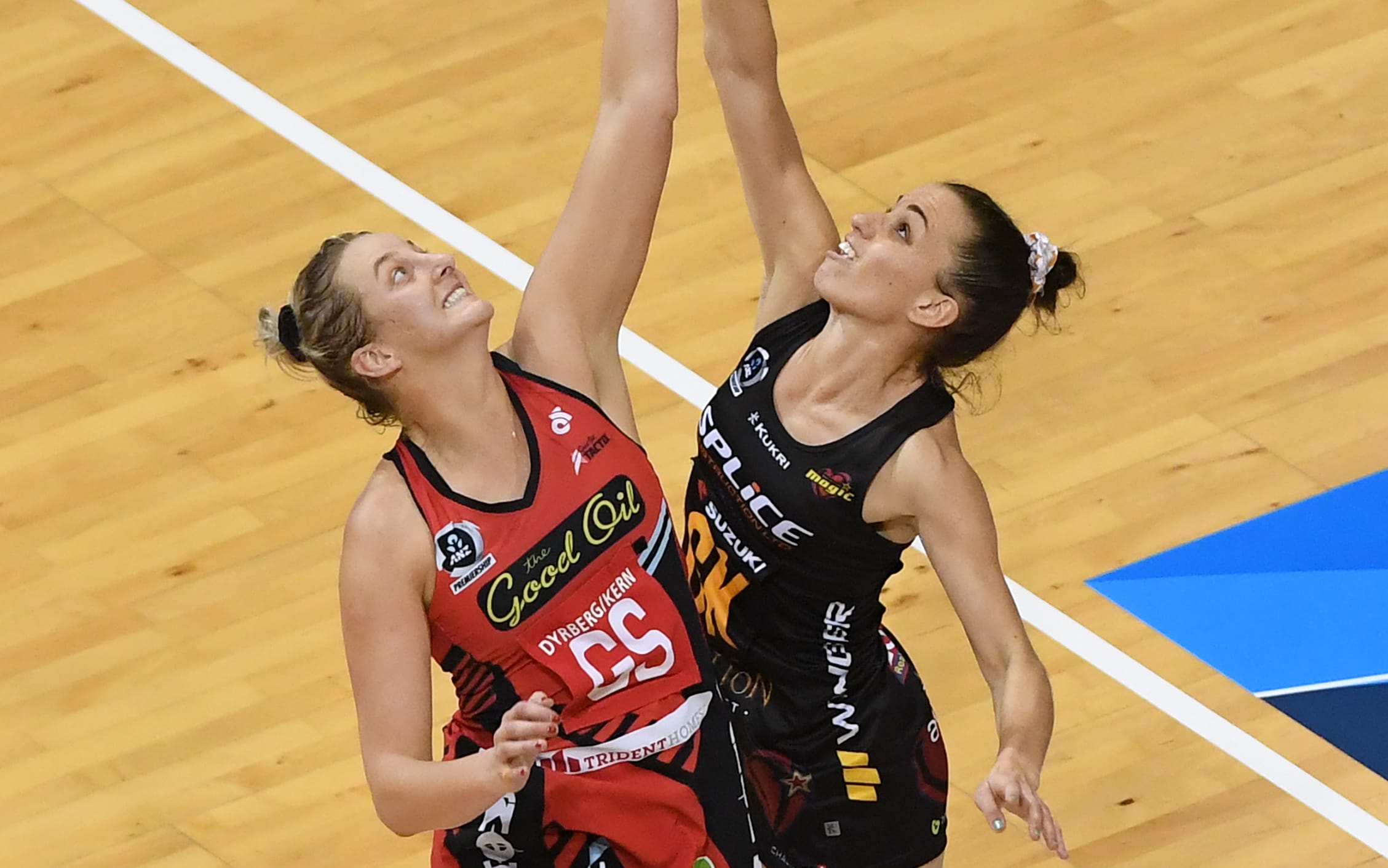 Ellie Bird and Georgia Tong compete in the air.