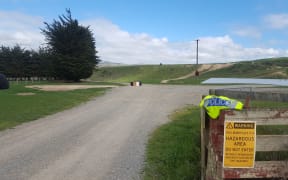 The entry to the North Otago farm where a mother and her young son died when the tractor they were on slipped into a reservoir.